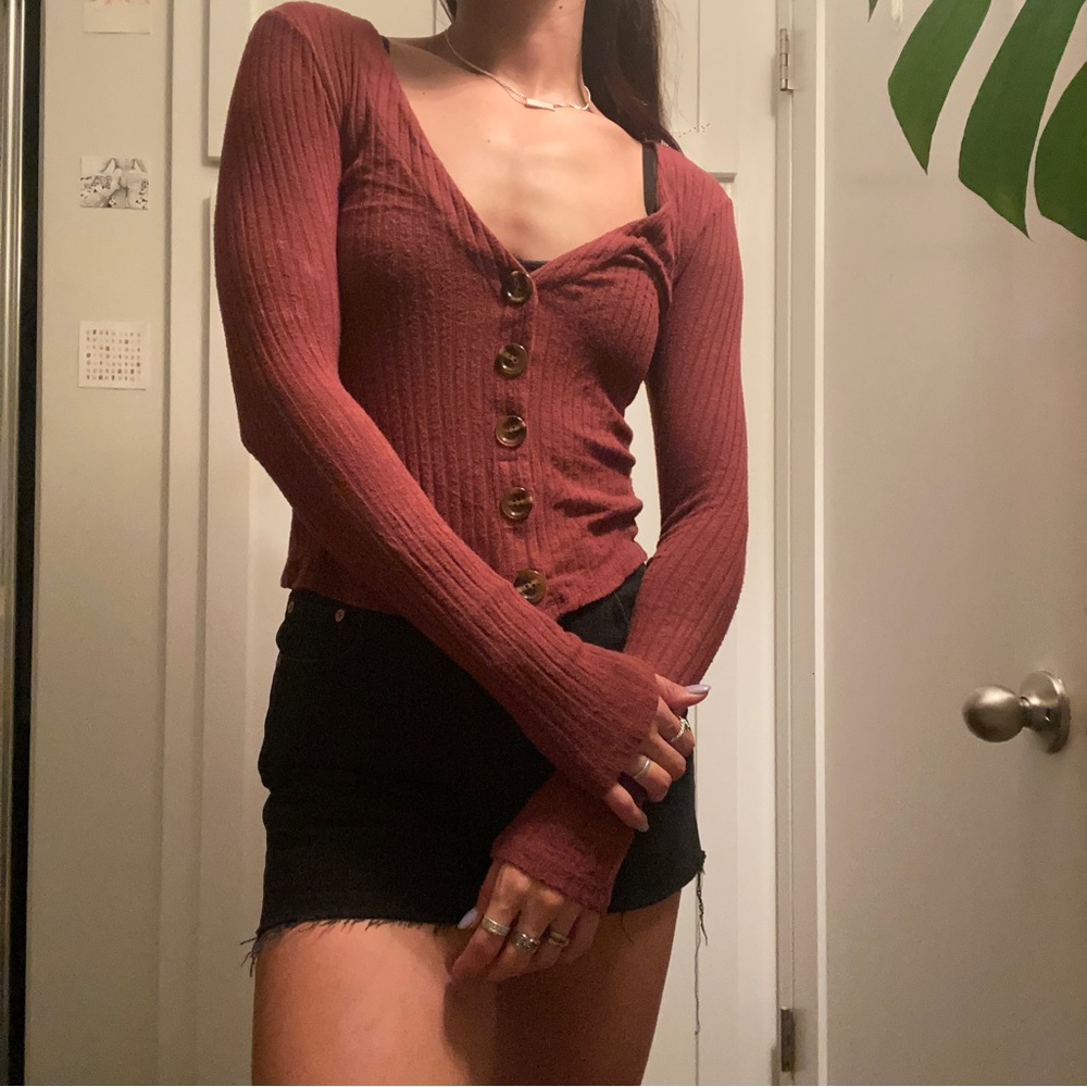 Out from under cardigan